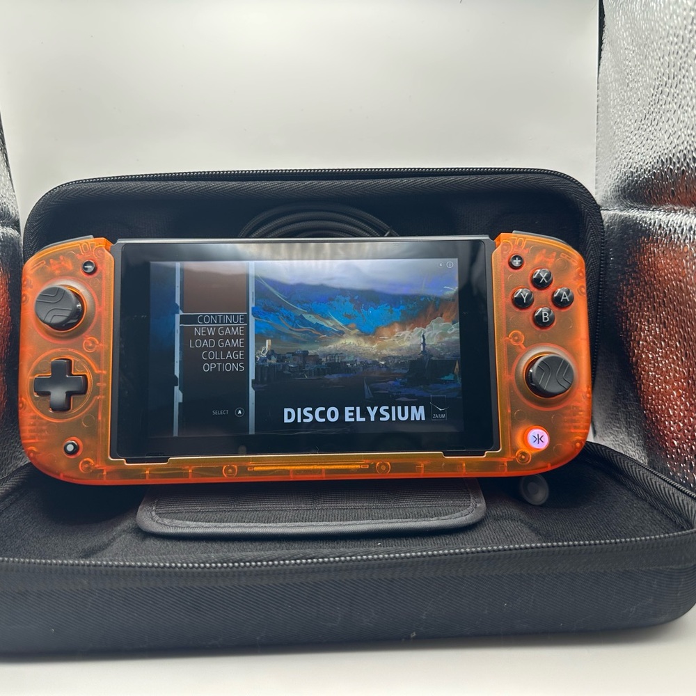 CRKD Nitro Deck Orange Nintendo Switch Controller & Case (SWITCH NOT INCLUDED)